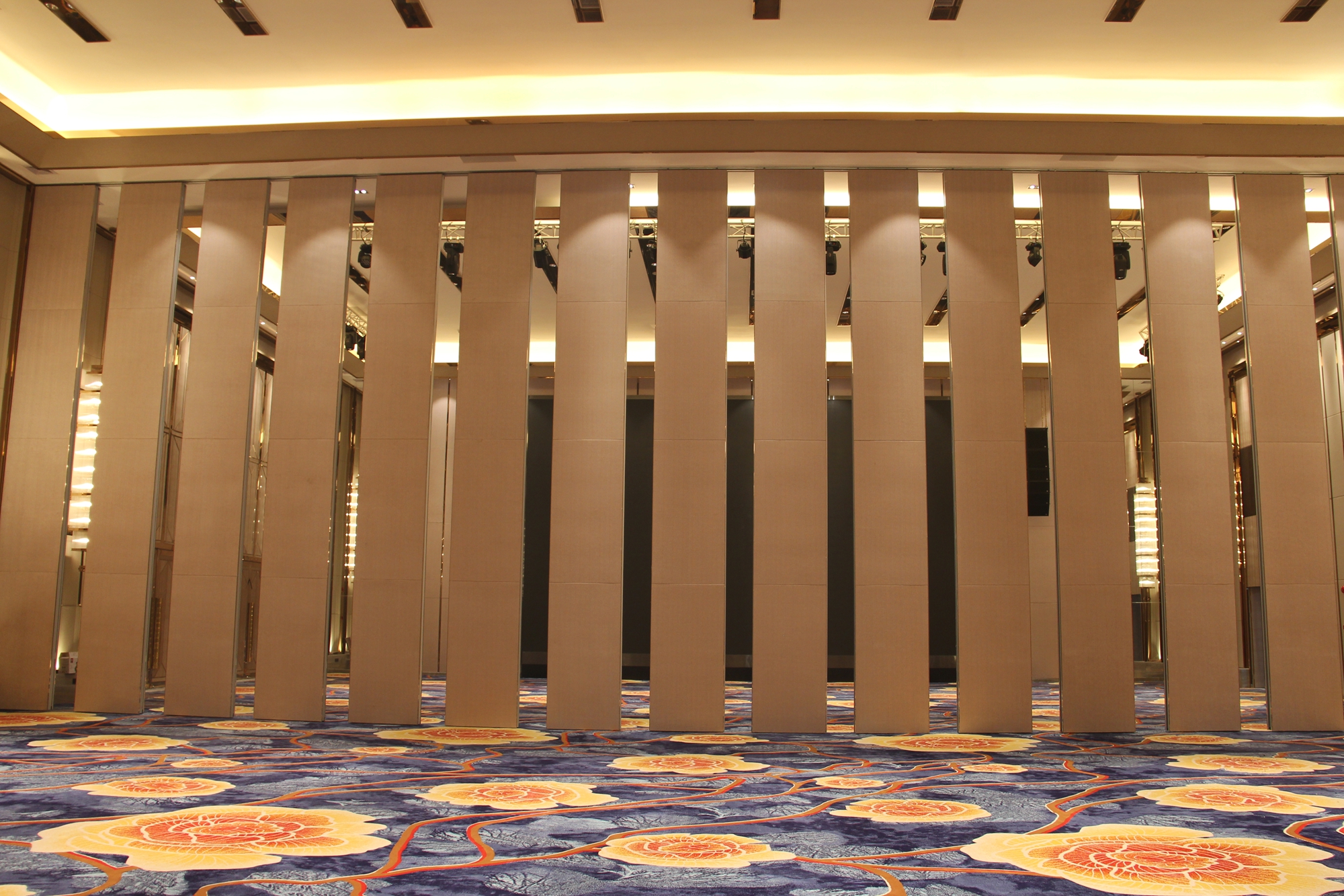 Ultra-high operable partition walls in an atrium